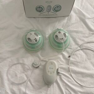 Elvie Green and White Breast Pump